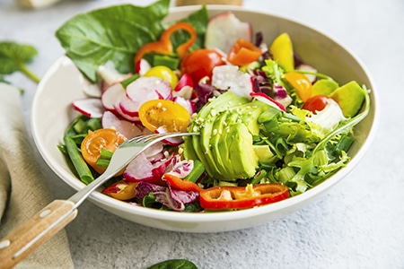 Fresh vegetable salad bowl closeup, healthy organic vegetables s